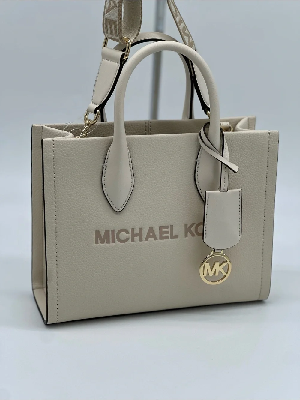 Michael Kors Cream Pebbled Leather Satchel with Logo Strap
